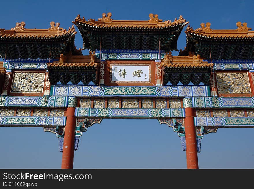 A photograph showing the detail of a Buddhist temple and Chinese architecture. A photograph showing the detail of a Buddhist temple and Chinese architecture.