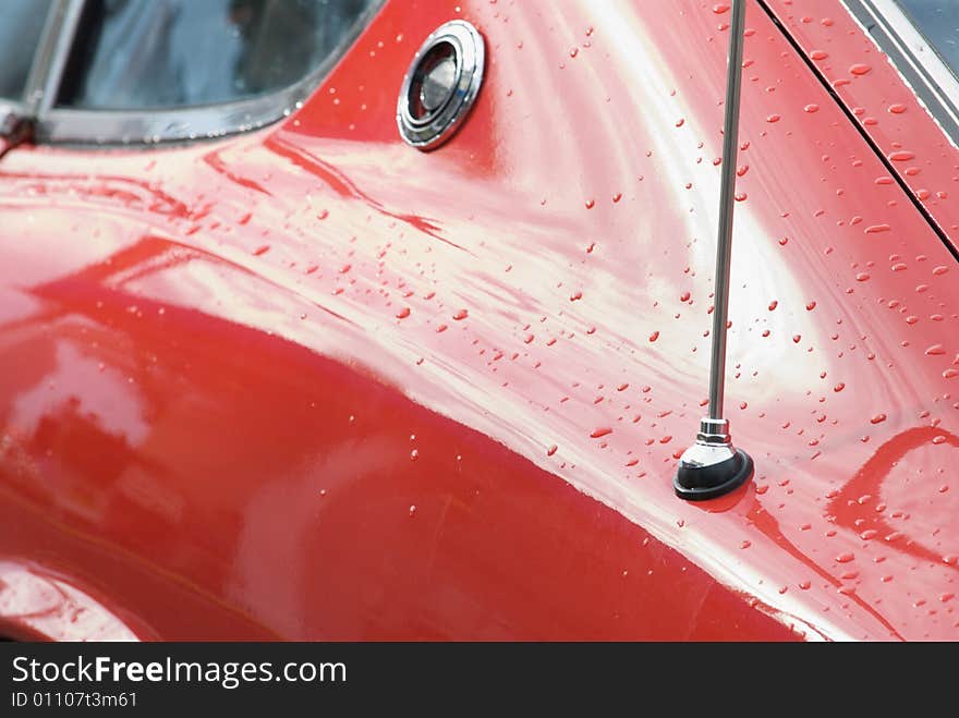 The curves and beautiful lines of a classic red sports car. The curves and beautiful lines of a classic red sports car