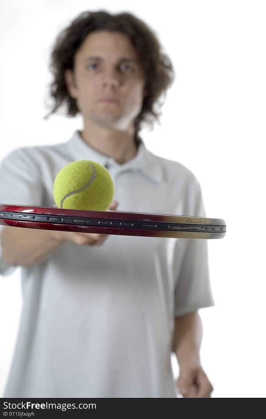 Man Balancing a Tennis Ball - Vertical