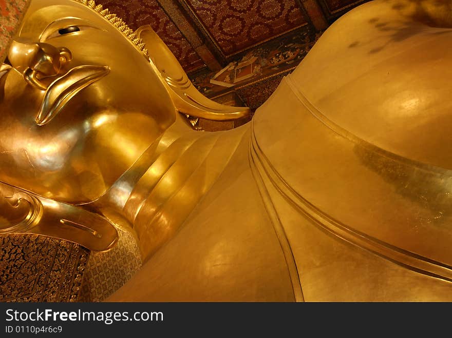 The Buddhist Temple Wat Pho, commonly known as the Temple of the Reclining Buddha, was originally built in 1688 in the Phra Nakhon district of Bangkok Thailand. The temple, however, didn't actually contain the 46m long, 15m high Reclining Buddha until it's casting in 1832 during the reign of King Rama III.