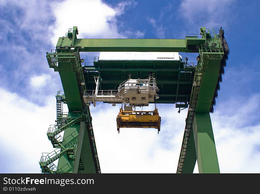 Huge modern port operating machines in one of the busiest port in Asia. Huge modern port operating machines in one of the busiest port in Asia.