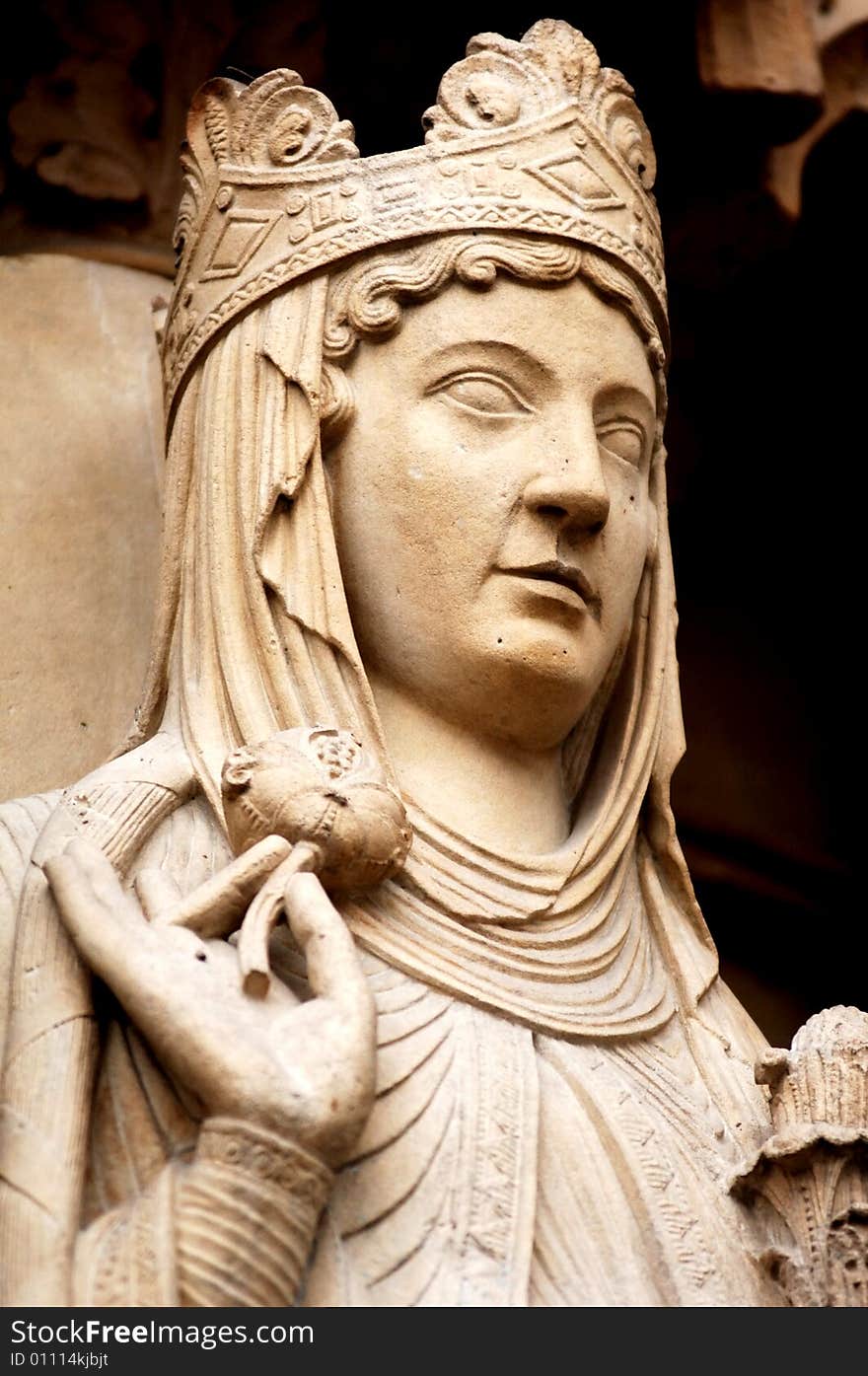 France, Paris: Notre Dame cathedral. View of a statue from the facade