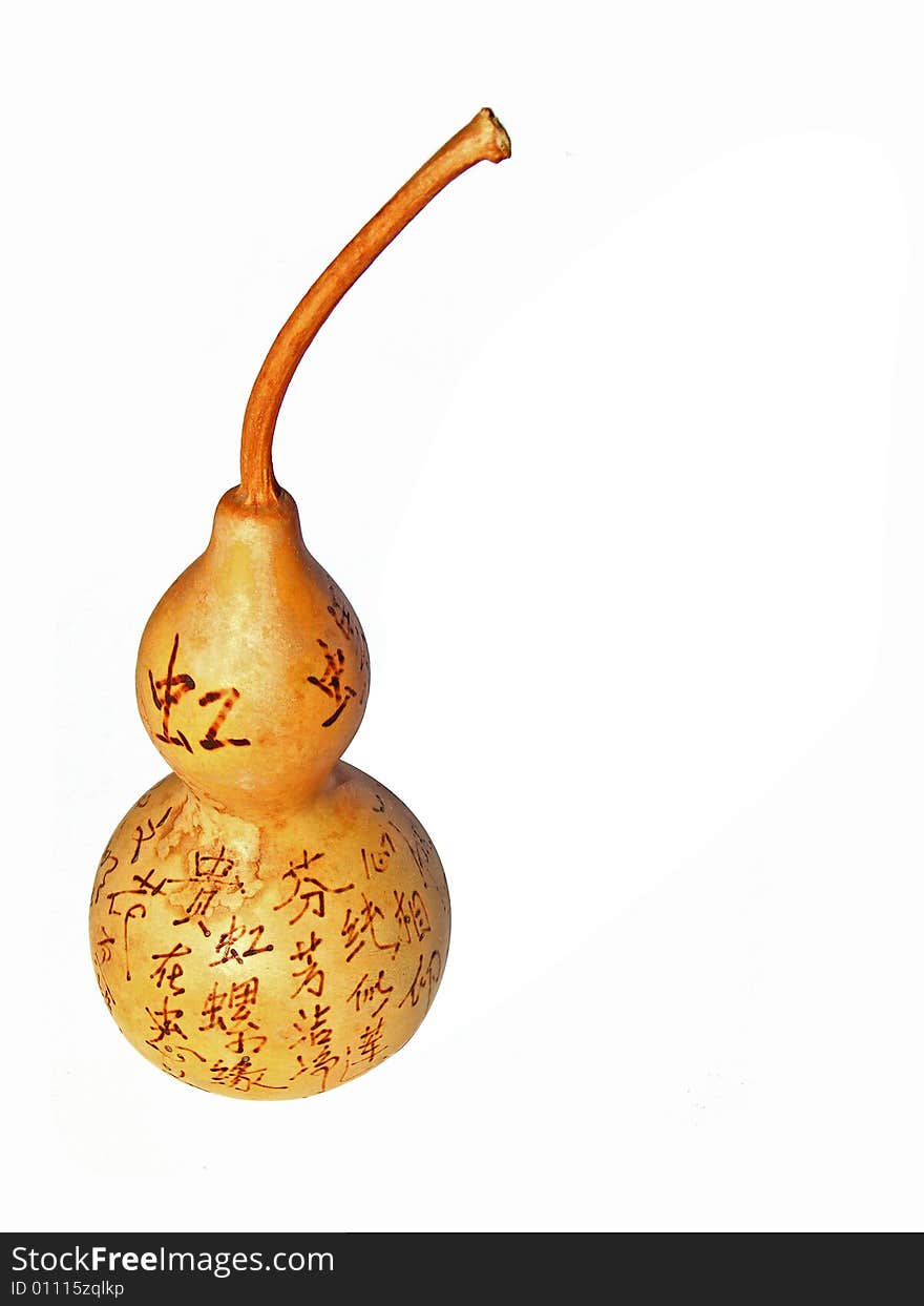 Bottle gourd with chinese characters on it.