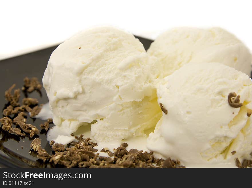 Ice cream on plate isolated