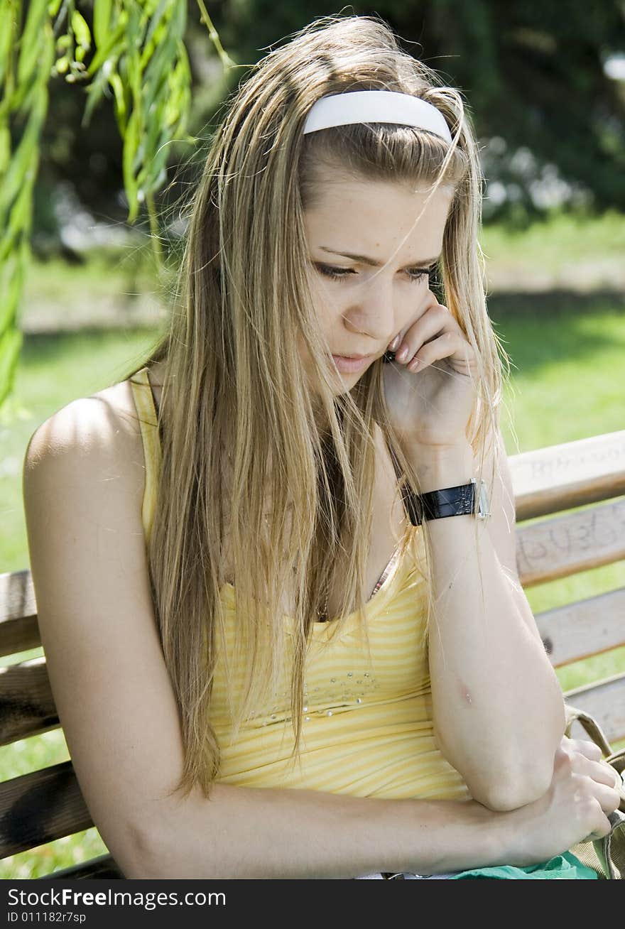 Girl calling by phone outdoor. Girl calling by phone outdoor