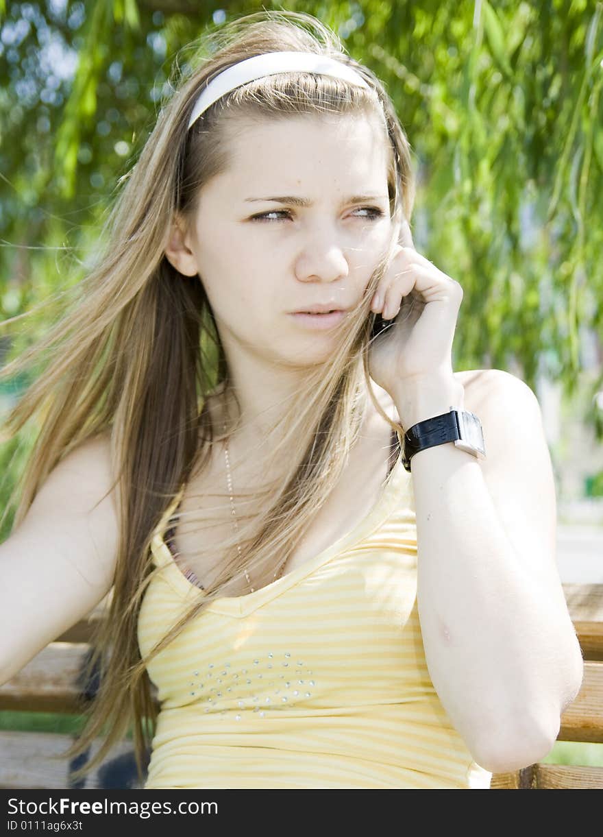 Girl calling by phone outdoor