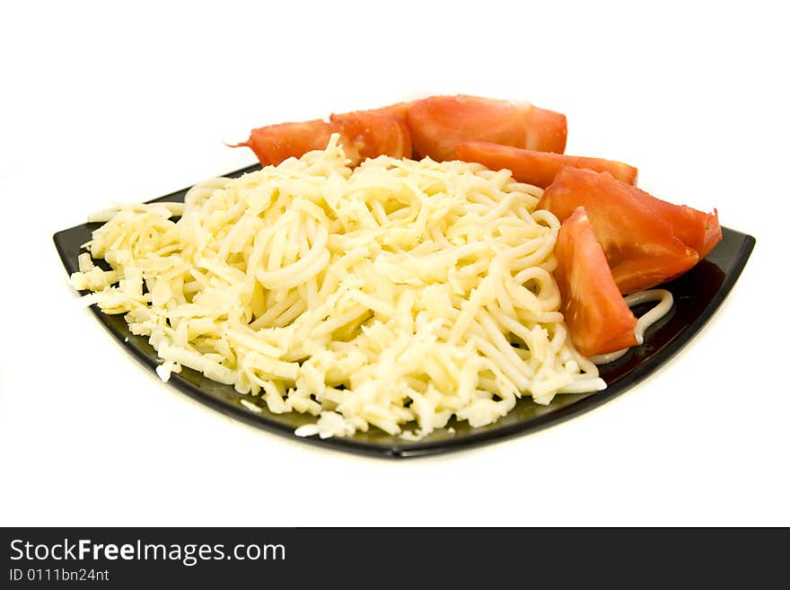 Macaroni and tomatoes on plate