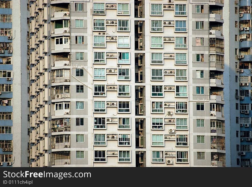 China, modern Chinese skyscrapers close photos - visable windows, balcony, walls. China, modern Chinese skyscrapers close photos - visable windows, balcony, walls.