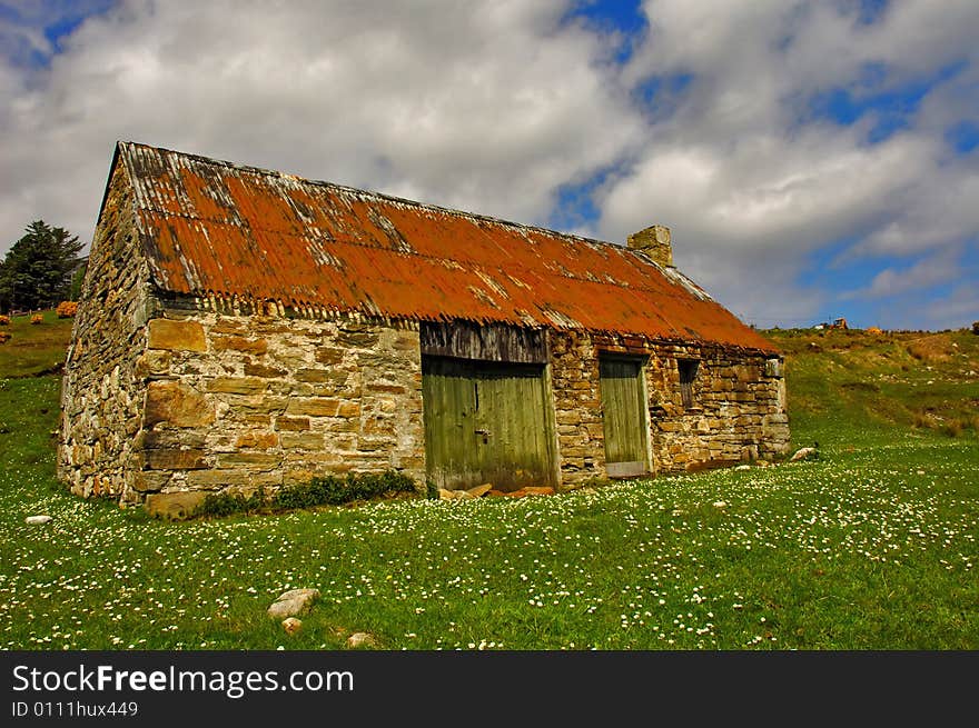 Old farm house with red tin roof