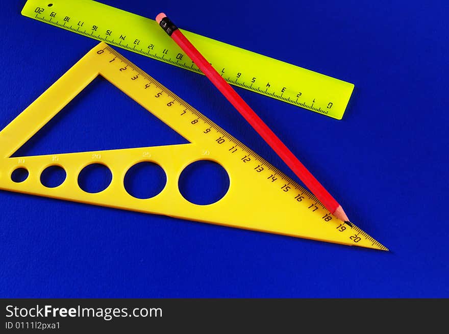 Group of office accessories on a color cardboard