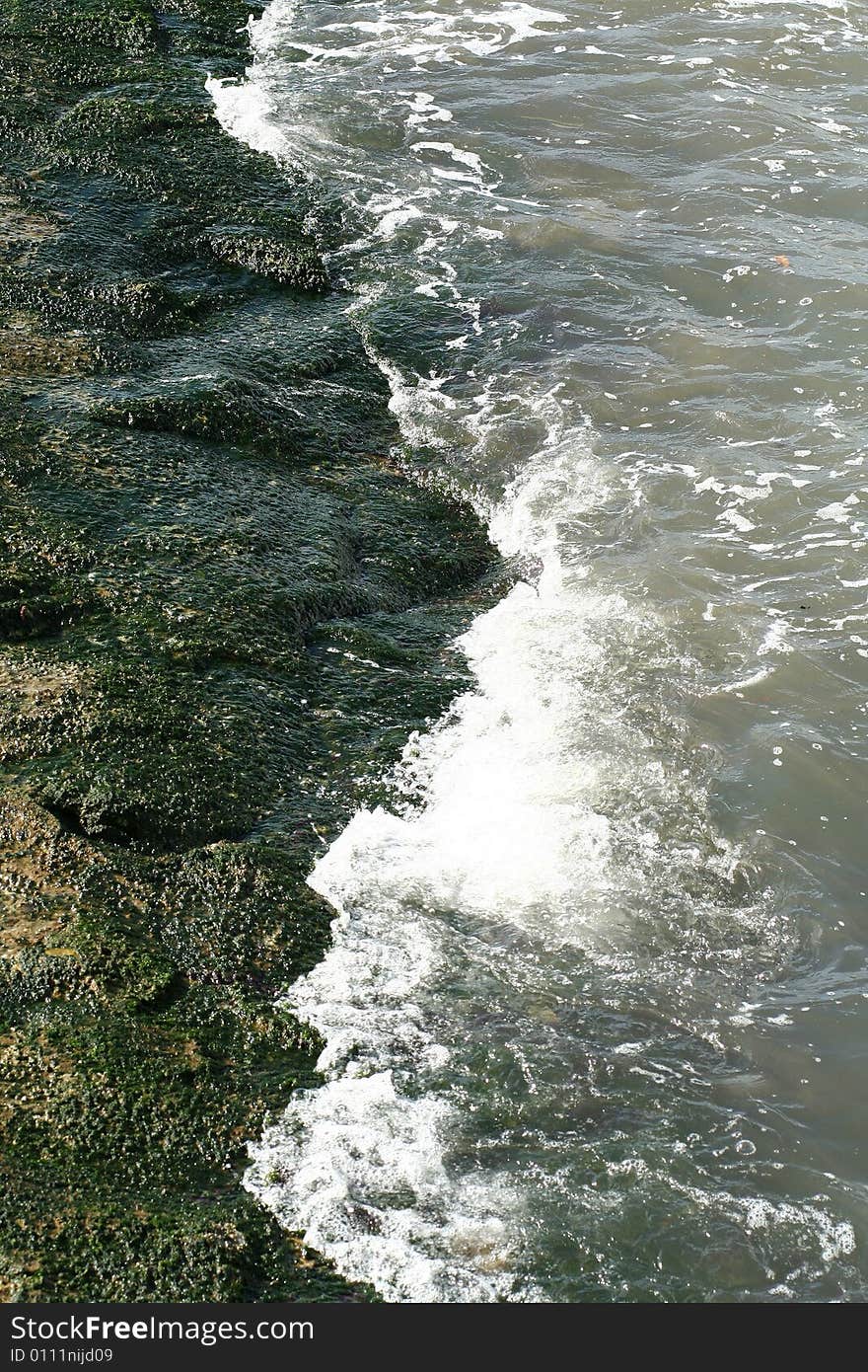 Sea side with wave splashing