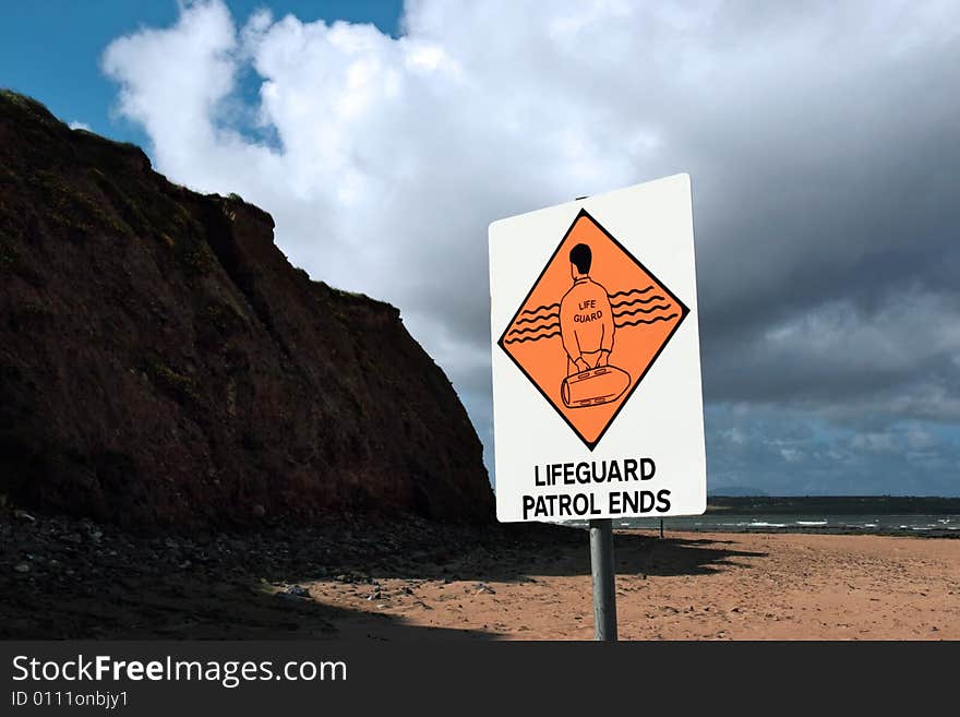 A sign warning that there is no lifeguard patrol beyond this sign. A sign warning that there is no lifeguard patrol beyond this sign