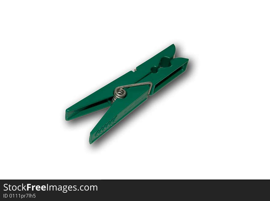 Ordinary green plastic pegs for linen