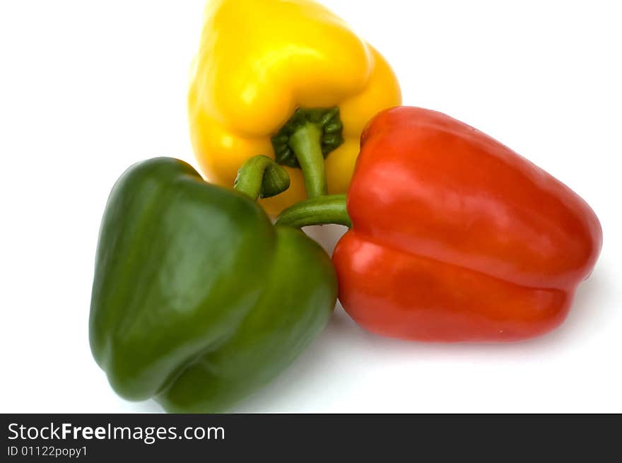 Yellow red and green pepper isolated on white background. Yellow red and green pepper isolated on white background