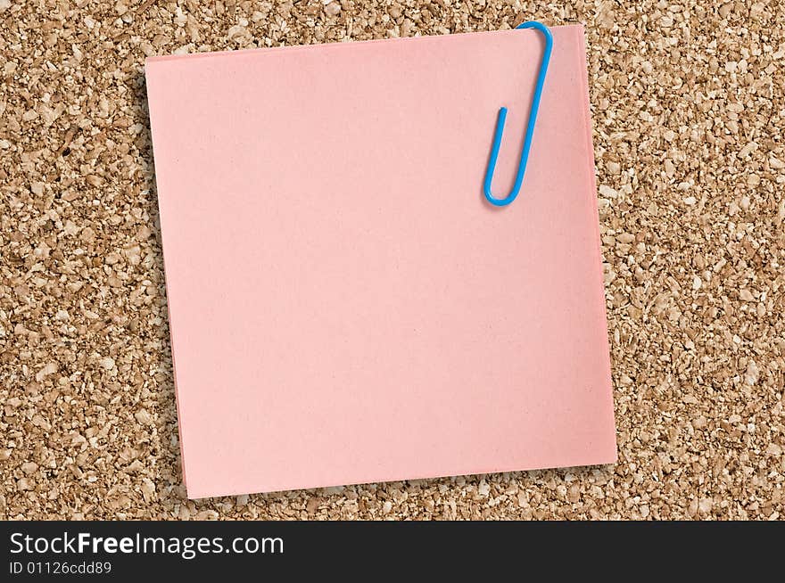 Pink paper note with clip