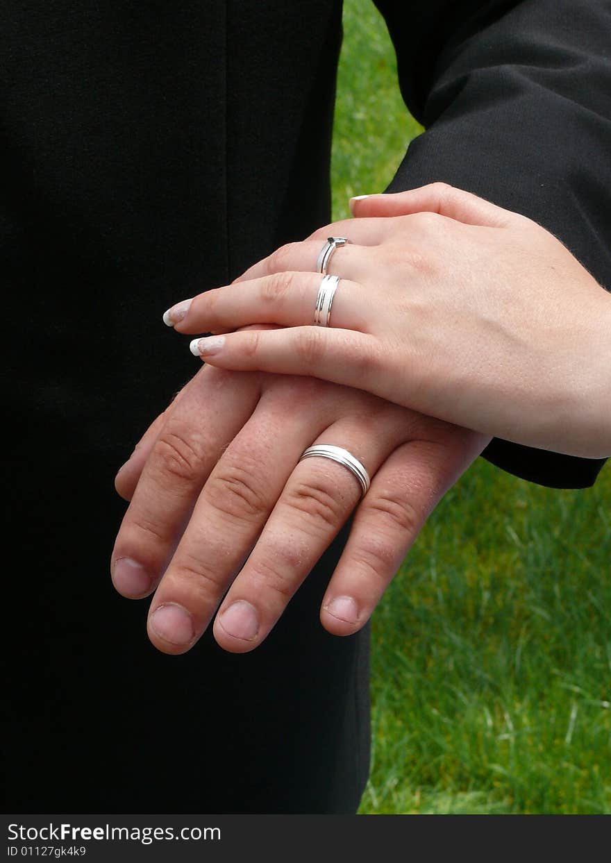 Two wedding rings and one betrothal ring