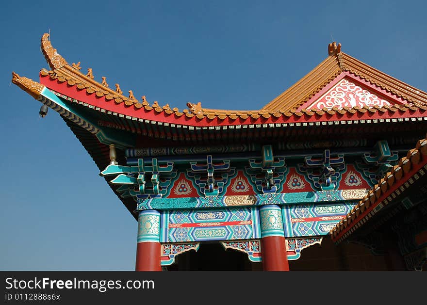 A photograph showing the detail of a Buddhist temple and Chinese architecture. A photograph showing the detail of a Buddhist temple and Chinese architecture.