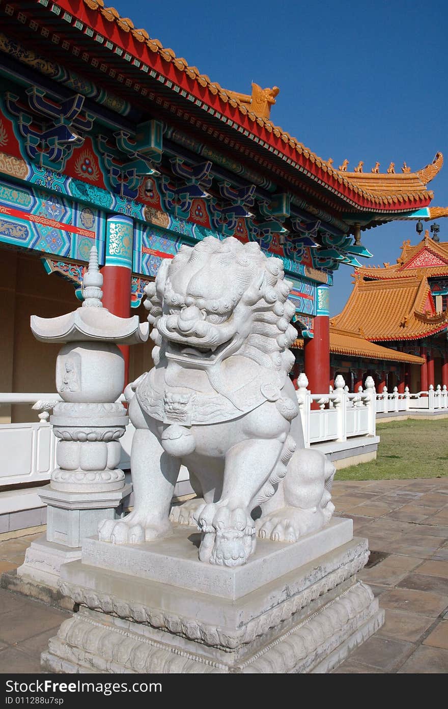 A photograph showing the detail of a Buddhist temple and Chinese architecture. A photograph showing the detail of a Buddhist temple and Chinese architecture.