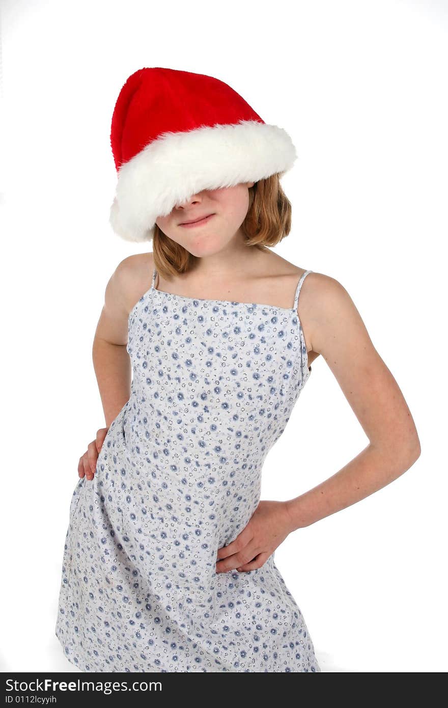 Cute girl in santa hat that has fallen over her eyes