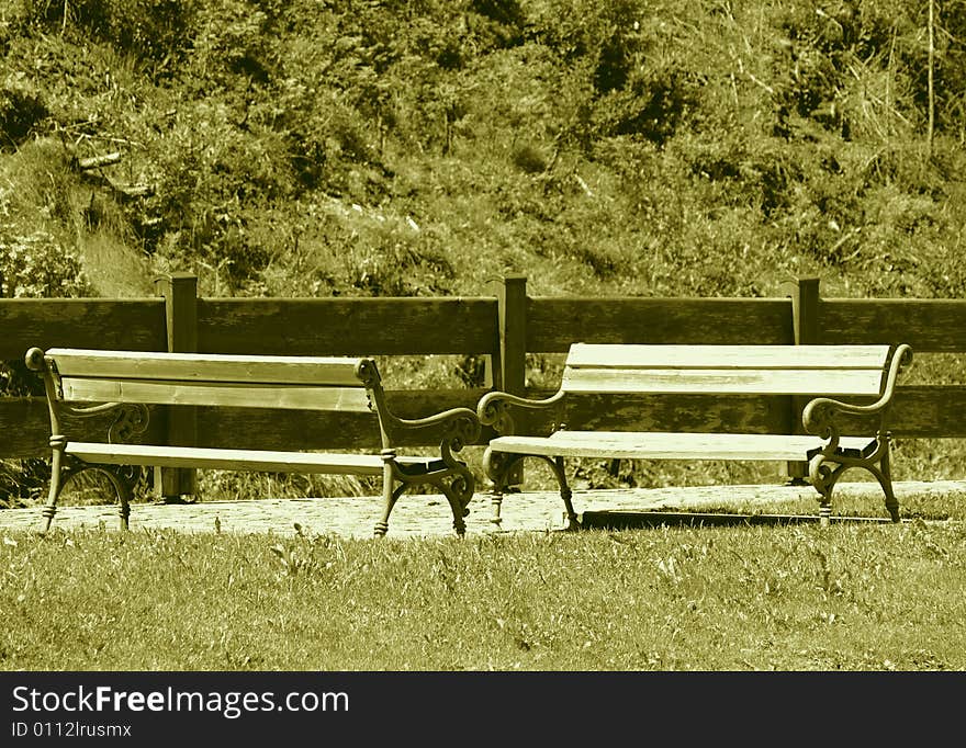 A relaxing shot of two benches in the main street of Selva Gardena. A relaxing shot of two benches in the main street of Selva Gardena