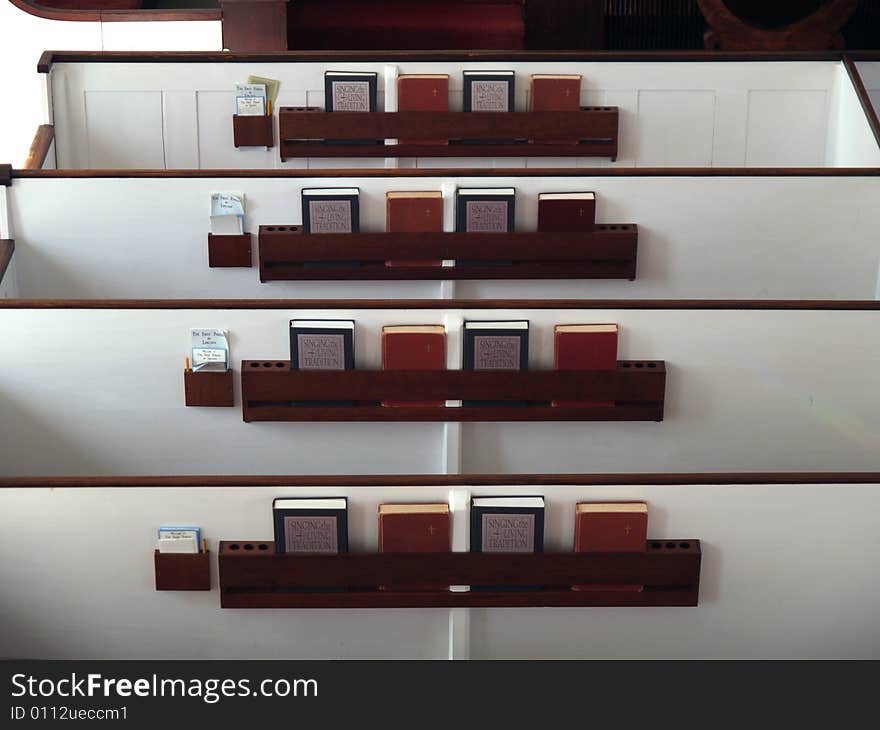 Church pews, seen from above, with hymnals. Church pews, seen from above, with hymnals.