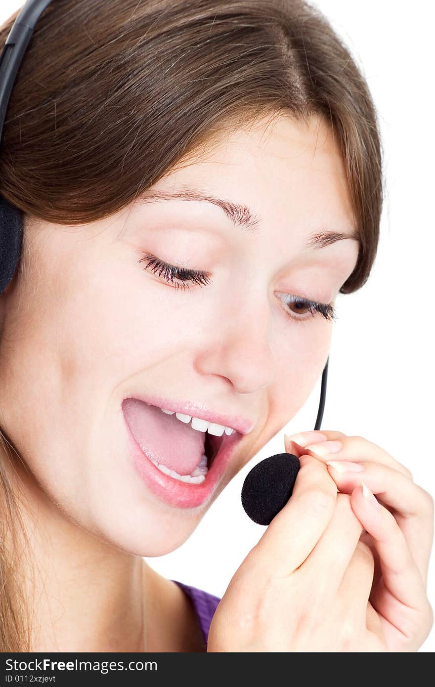 Portrait of a lovely lady with headset talking on white background. Portrait of a lovely lady with headset talking on white background