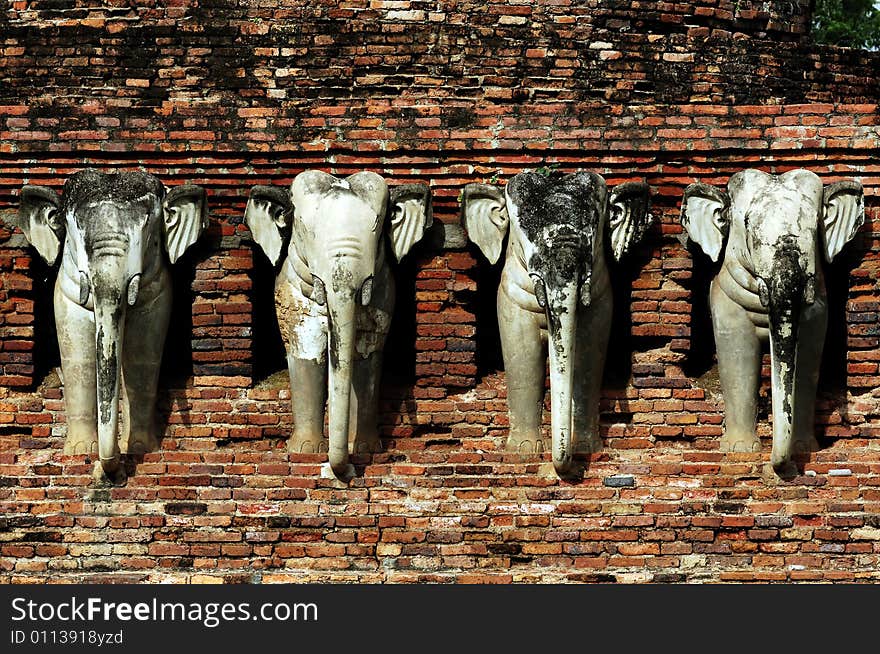 Thailand, Sukhothai or Sukothai was the capital of the Thai Empire founded in 1238. Wat Sorasak is a chedi with elephants figures encircling its base. Thailand, Sukhothai or Sukothai was the capital of the Thai Empire founded in 1238. Wat Sorasak is a chedi with elephants figures encircling its base.