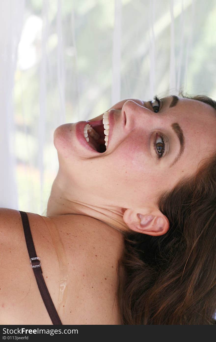 Portrait of a beautiful and happy young woman.