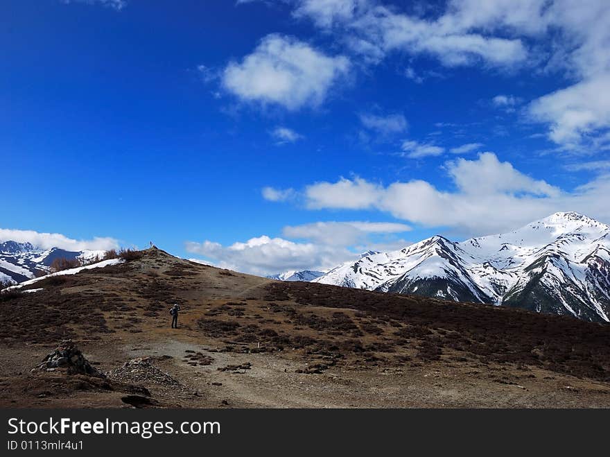 Trekking up to the top of a snow mountain.