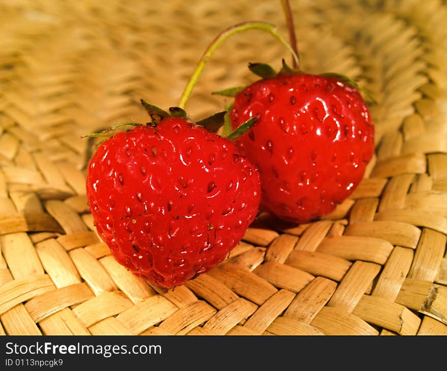 Strawberry in basket on bright summer day