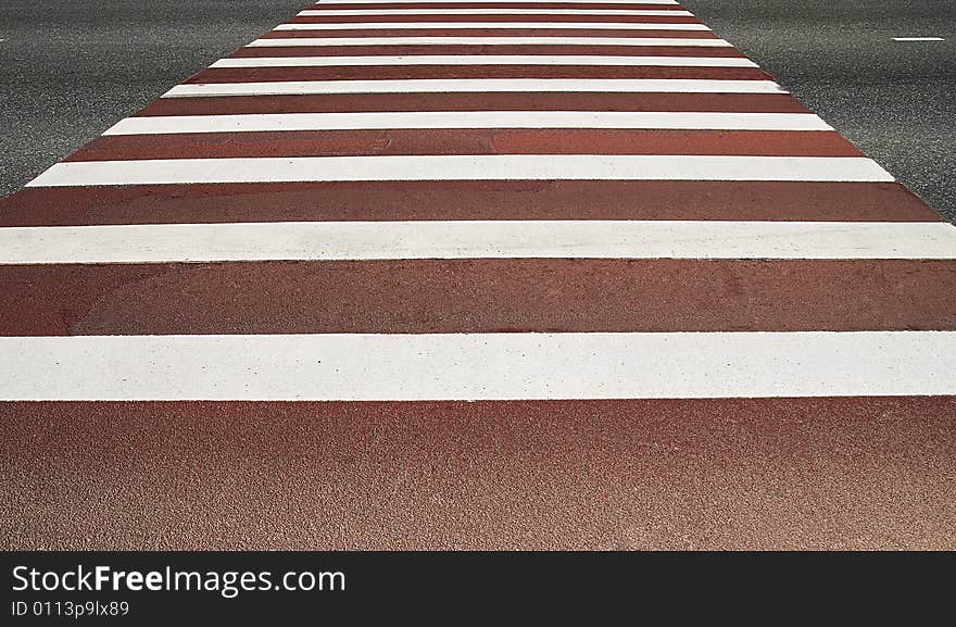 Red and white pedestrian crossing