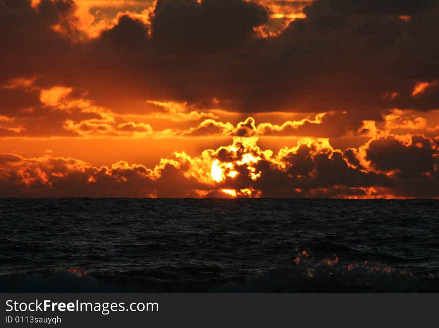 Sunset dark sky and Atlantic ocean. Sunset dark sky and Atlantic ocean