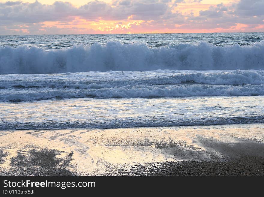 Sunset sky and surf of Atlantic ocean. Sunset sky and surf of Atlantic ocean