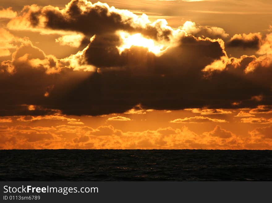 Sunset darken sky and Atlantic ocean. Sunset darken sky and Atlantic ocean