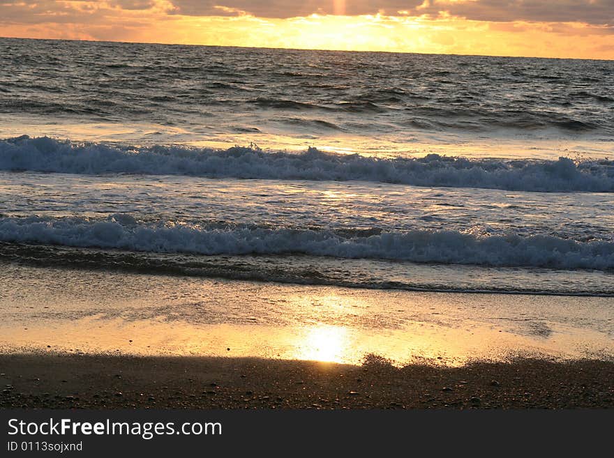 Sunset darken sky and Atlantic ocean. Sunset darken sky and Atlantic ocean