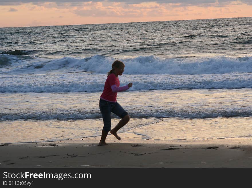 Running girl on the beach. Running girl on the beach