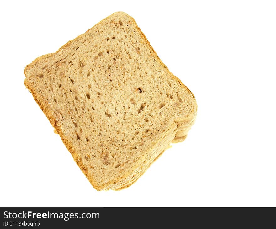 Up view of slices of bread piled on top of each other isolated on white. Up view of slices of bread piled on top of each other isolated on white