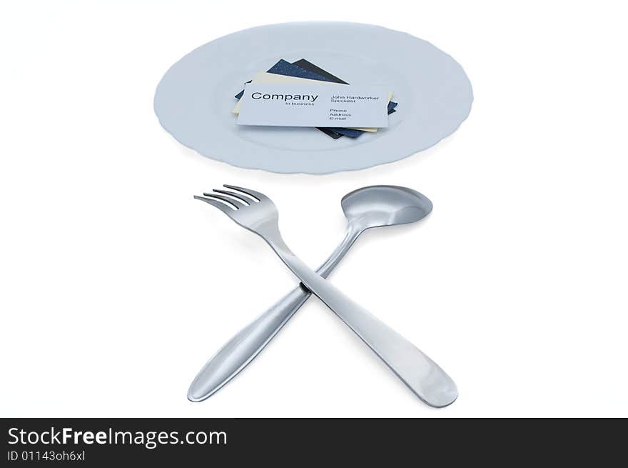 Business cards on plate, fork and spoon. Business cards on plate, fork and spoon