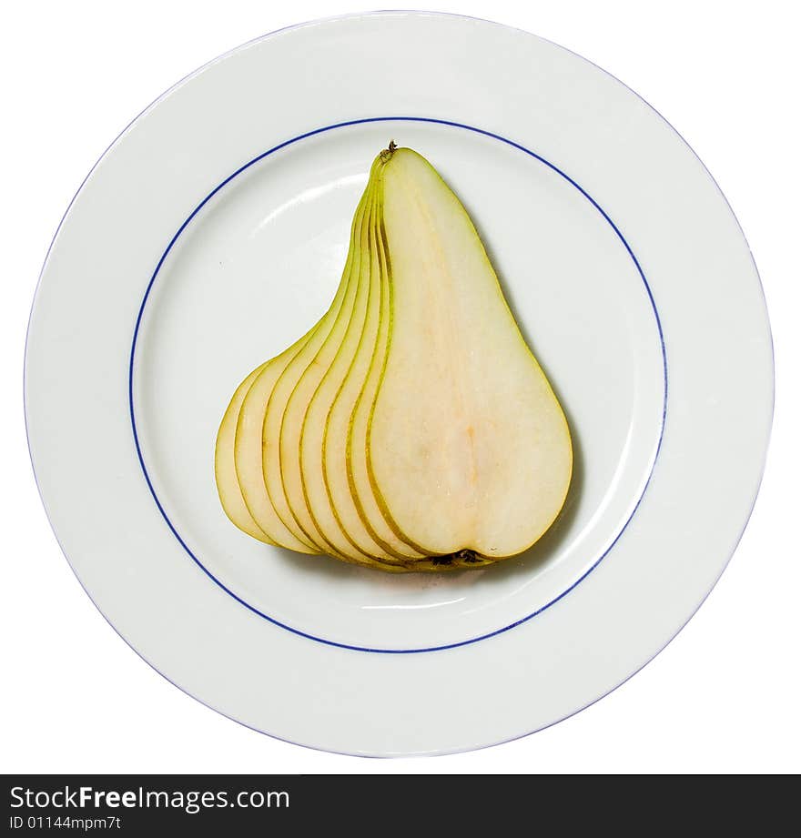 Pear on a plate, it is thin it is cut, combined as a ladder