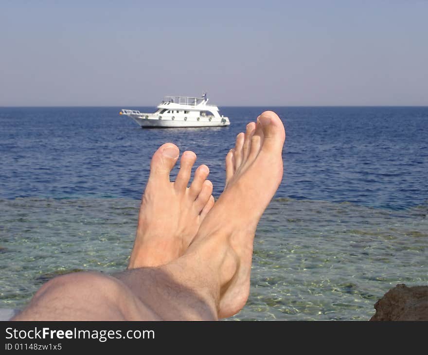 Feet And Boat