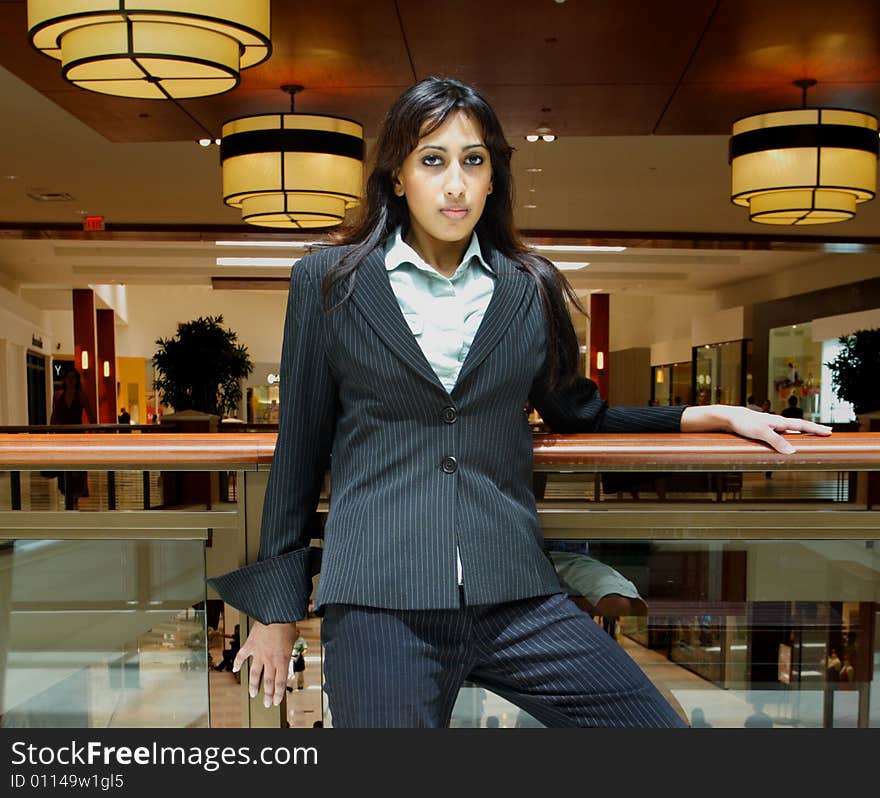 Businesswoman In A Mall