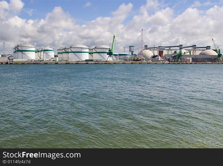 Klaipeda port reservoirs under blue skies. Klaipeda port reservoirs under blue skies