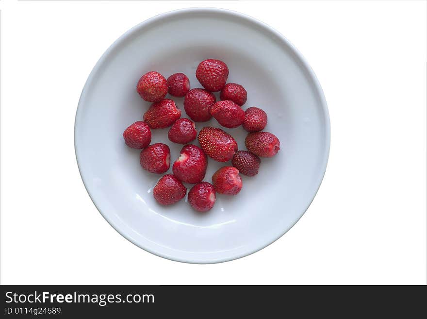 Strawberries on the plate isolated on white. Strawberries on the plate isolated on white