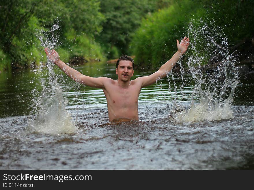 Young man divorces hands in hand and jumps from the wate. Young man divorces hands in hand and jumps from the wate