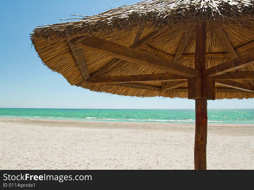 Umbrella and blue sea