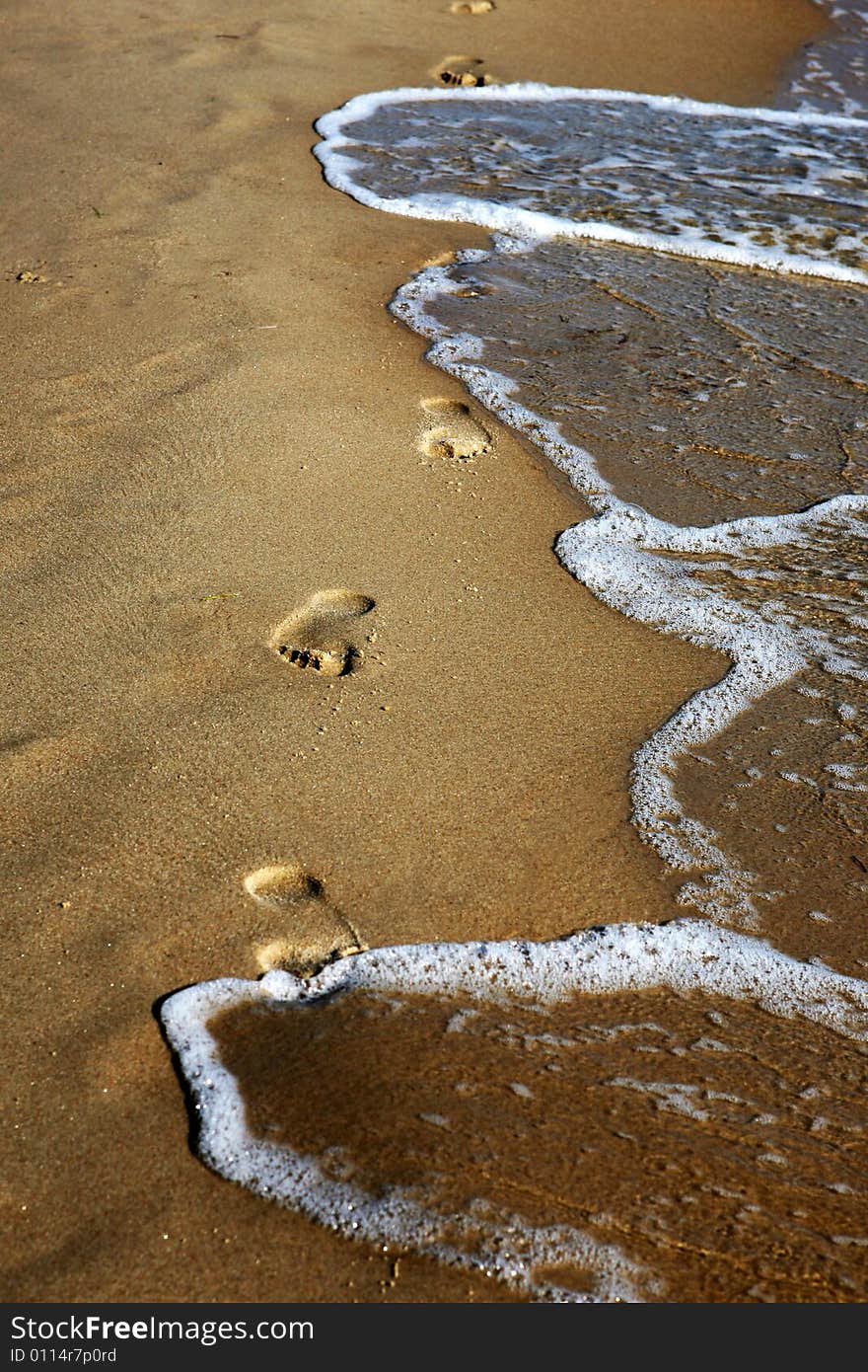 Footprints On The Beach