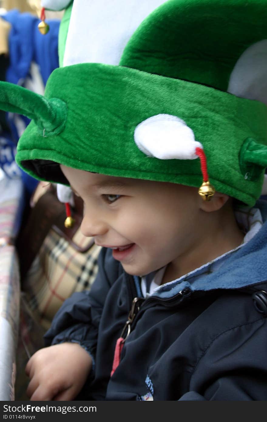 A young boy dressed up for the Mardi Gras celebration.