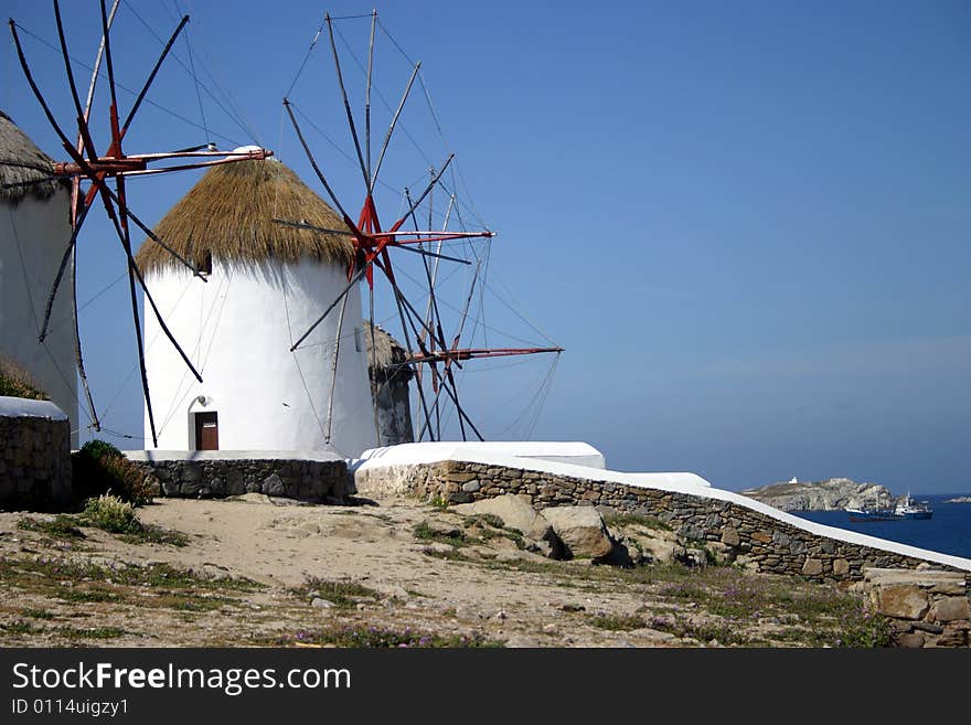 The famous white Windmills on Mykonos, a Greek island. The famous white Windmills on Mykonos, a Greek island.