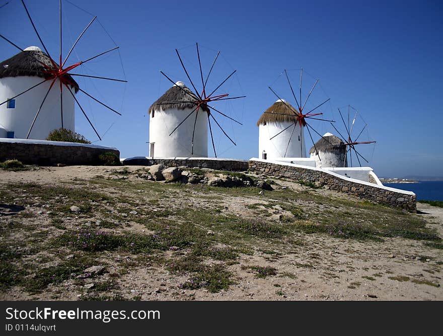 The famous white Windmills on Mykonos, a Greek island. The famous white Windmills on Mykonos, a Greek island.