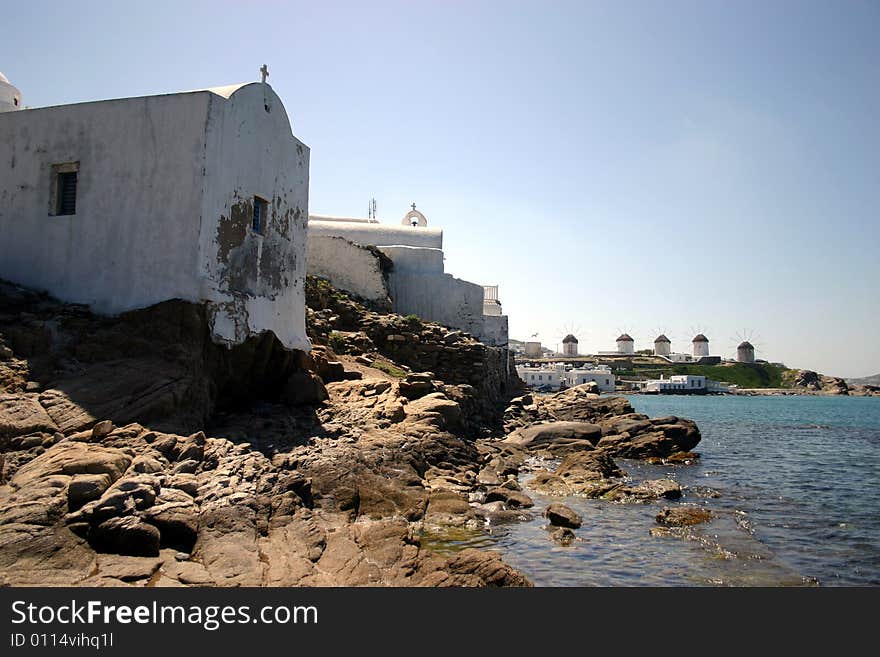 The famous White Church and windmills on Mykonos in the Greek Islands